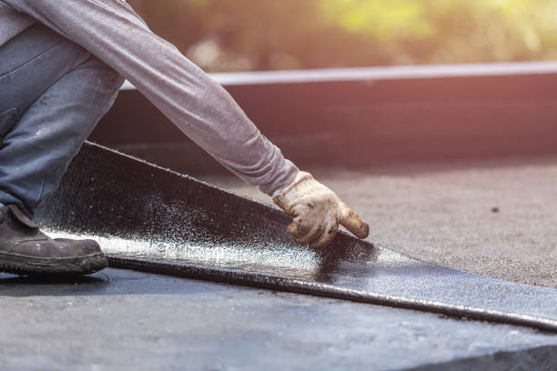Professional Waterproofing technician working in Huntsville, TN